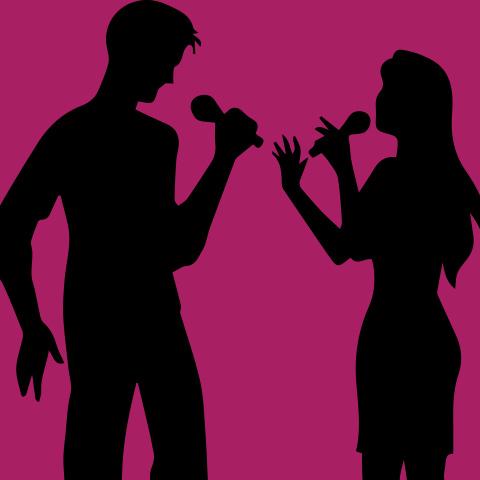 Silhouette of people singing with microphones