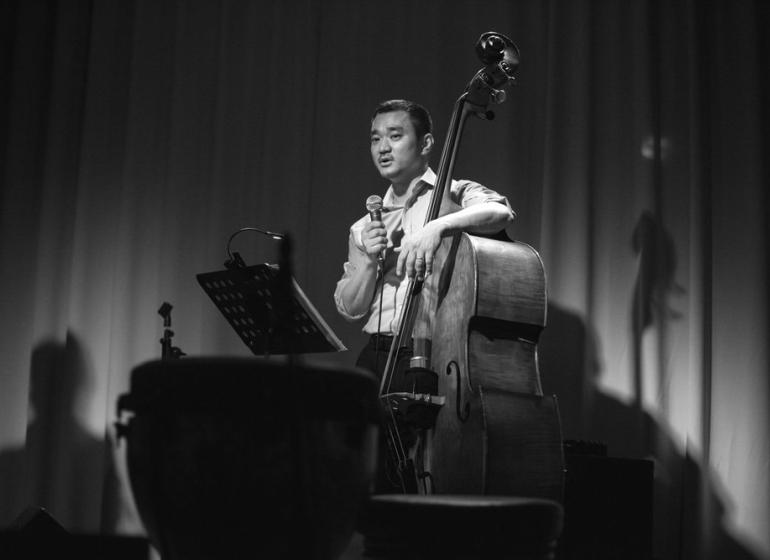 Ray Seol on stage with his double bass
